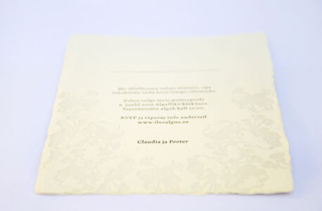minimalistic letterpress wedding invitation with flowers
